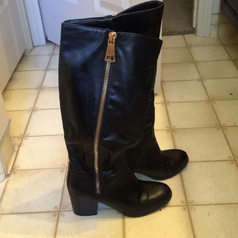 Black boots with gold zipper. 2 inch heel.